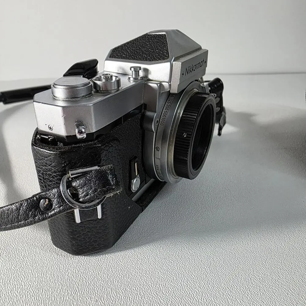 Nikon Nikkormat FT Film Camera Silver with Half Case & Accura 500mm Lens
